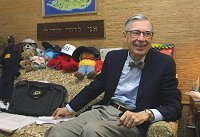 Fred Rogers, 73, relaxes in his Family Communication Inc. office in Pittsburgh earlier this month.  Photo/Gary Tramontina